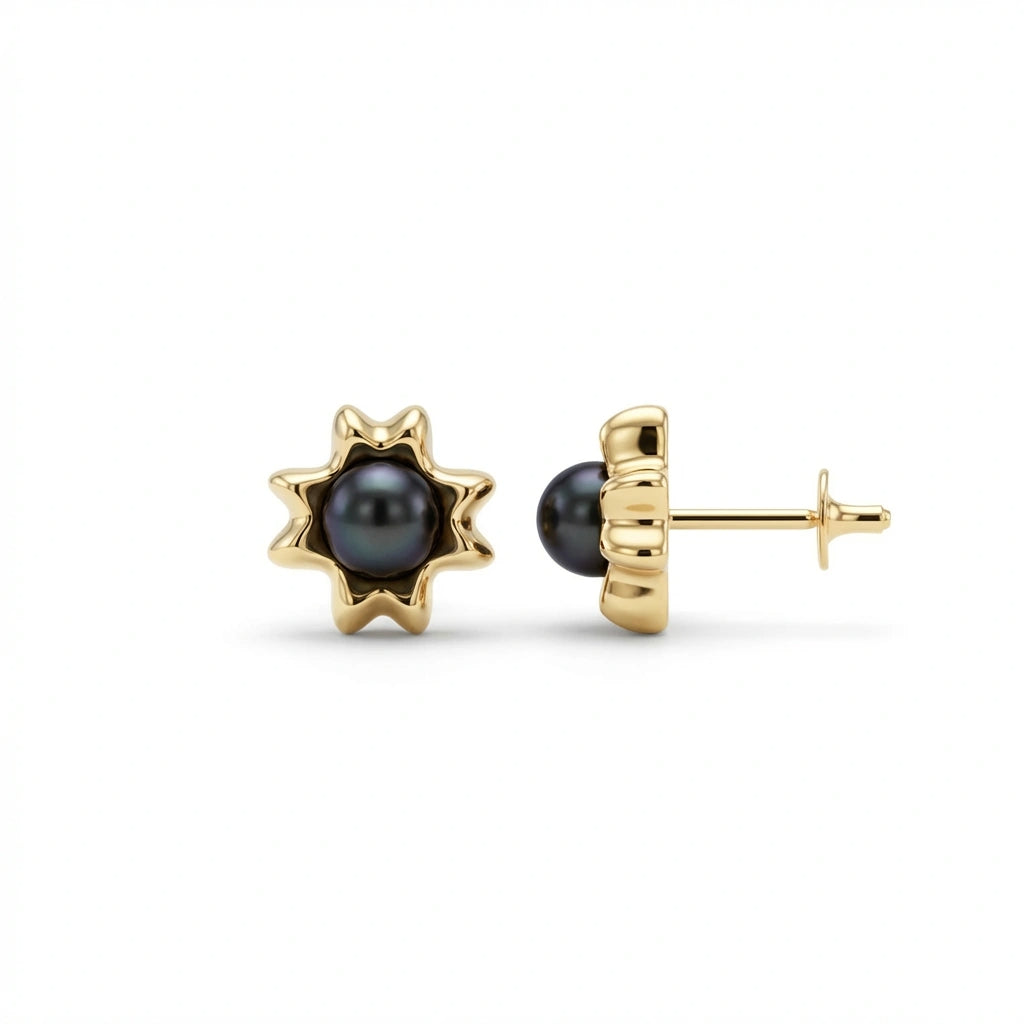 Noir Astra Black Pearl Stud Earrings in solid 14K yellow gold, black pearl centerpiece with sculptural starburst setting