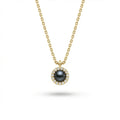 Solid 14K yellow gold black pearl halo pendant with round diamond surround on fine chain