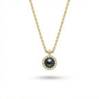 Solid 14K yellow gold black pearl halo pendant with round diamond surround on fine chain