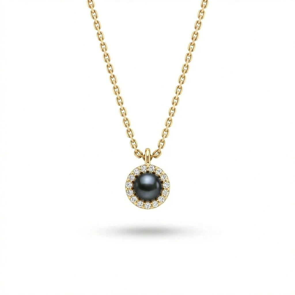 Solid 14K yellow gold black pearl halo pendant with round diamond surround on fine chain