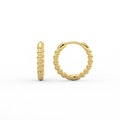 Orba Beaded Huggie Earrings in 14K gold side view showing hinged closure and beaded texture
