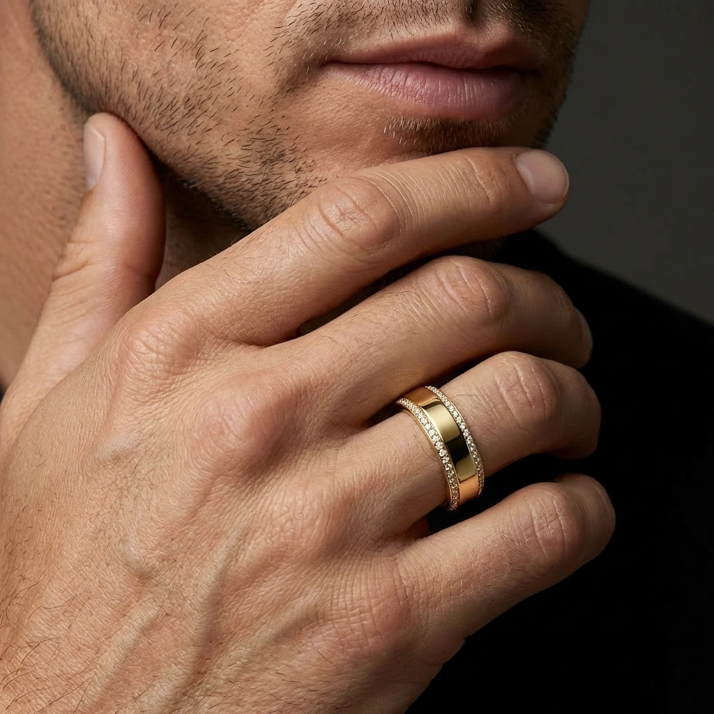 Man wearing double row diamond band in 14K gold with pavé set diamonds and polished center design