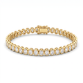 North-south oval bezel tennis bracelet in 14K yellow gold with oval Lab-Grown Diamonds and box clasp