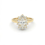 0.7ct oval diamond flower halo engagement ring in 14K yellow gold - top view showing petal-shaped halo detail