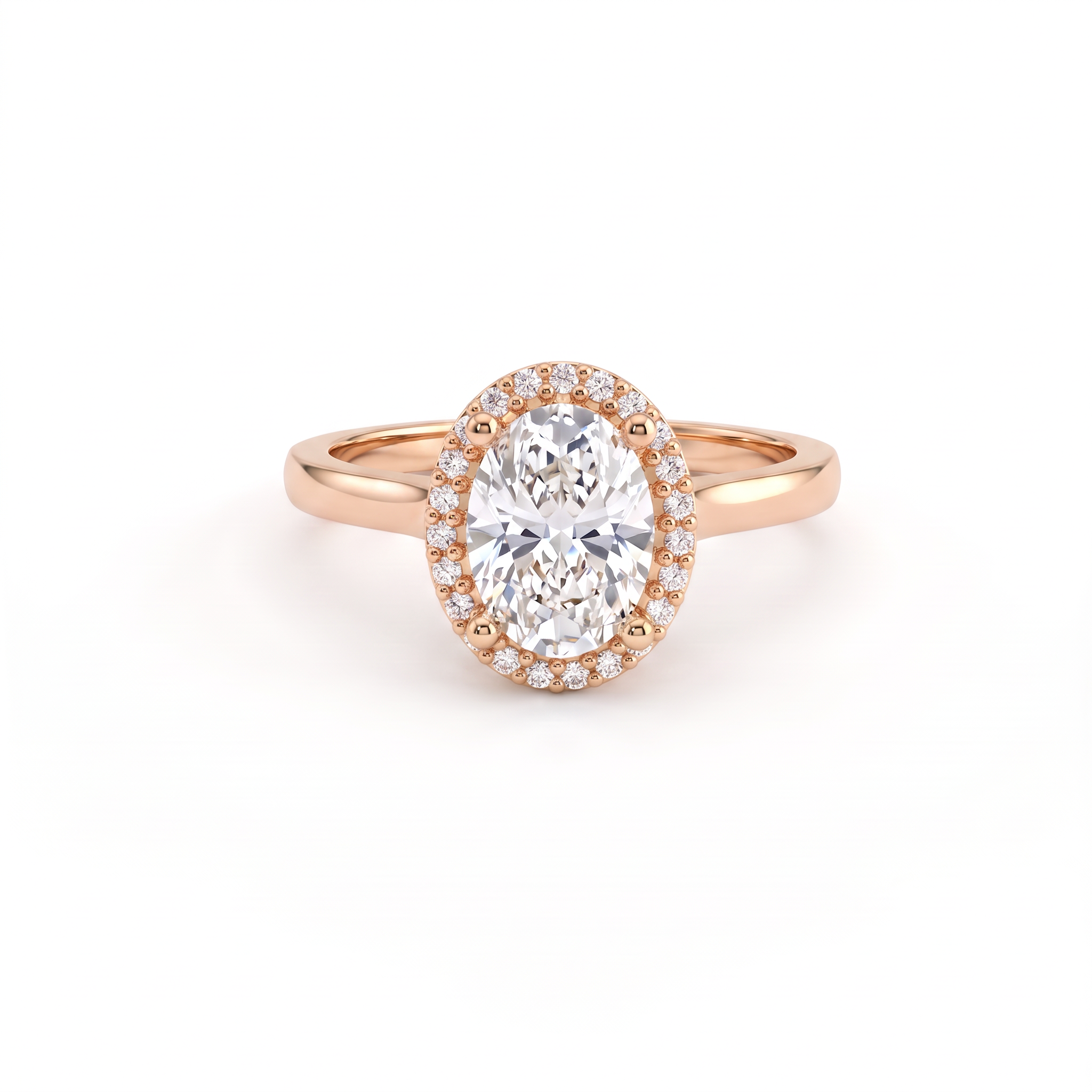 Oval halo engagement ring in solid 14K rose gold, oval Lab-Grown Diamond centre framed by a round brilliant halo on a thin band