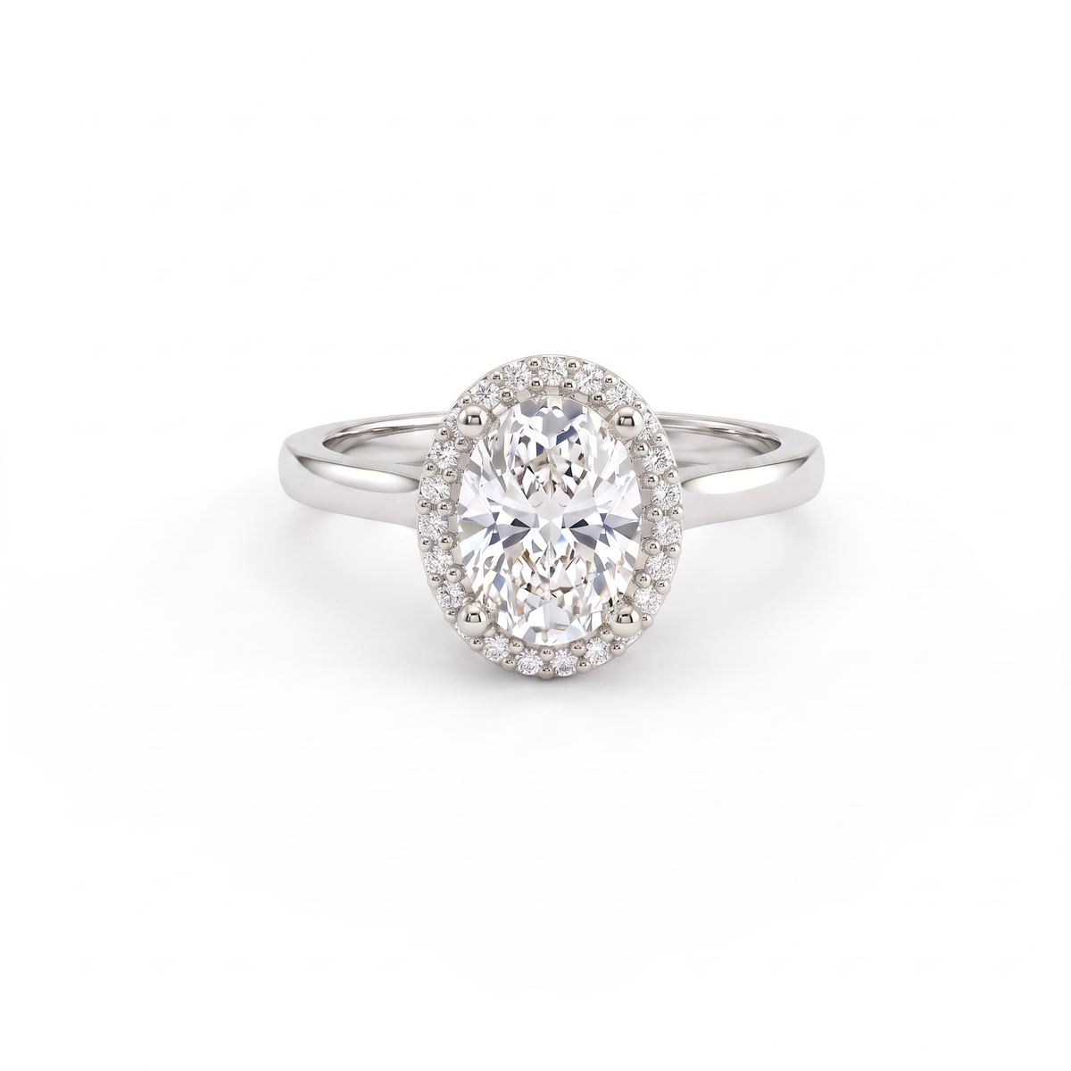Oval halo engagement ring in solid 14K white gold, oval Lab-Grown Diamond centre framed by a round brilliant halo on a thin band