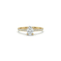Oval lab-grown diamond pavé engagement ring in solid 14K yellow gold with thin band and four-prong setting