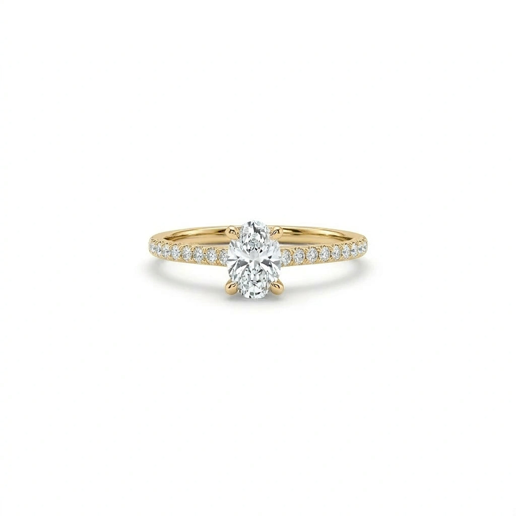 Oval lab-grown diamond pavé engagement ring in solid 14K yellow gold with thin band and four-prong setting