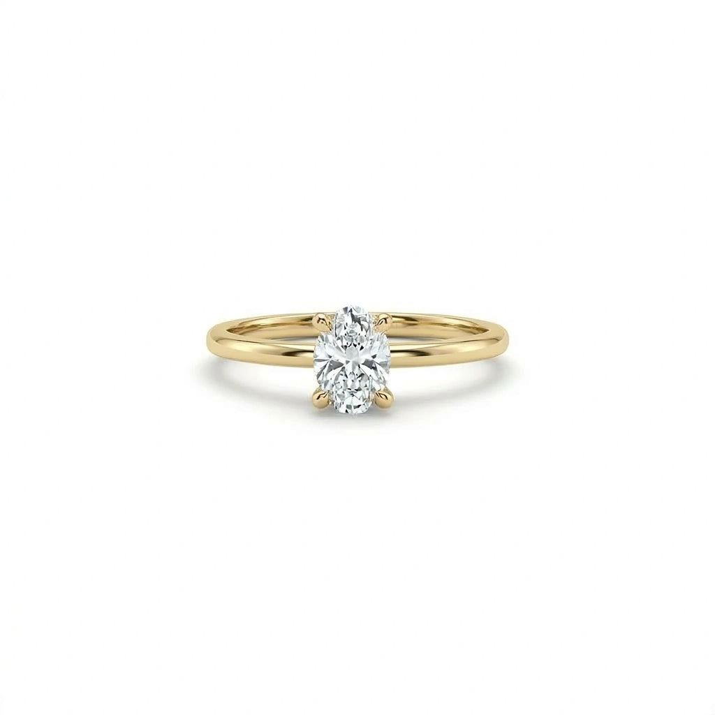 Oval lab-grown diamond solitaire engagement ring in solid 14K yellow gold with ultra thin band