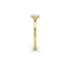 Rear profile of oval solitaire ultra thin engagement ring in solid 14K yellow gold