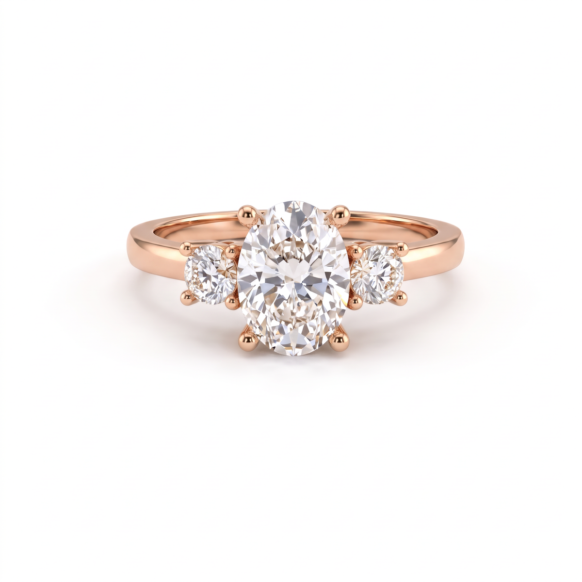 Oval three-stone engagement ring in solid 14K rose gold, 1ct oval Lab-Grown Diamond flanked by two round side stones