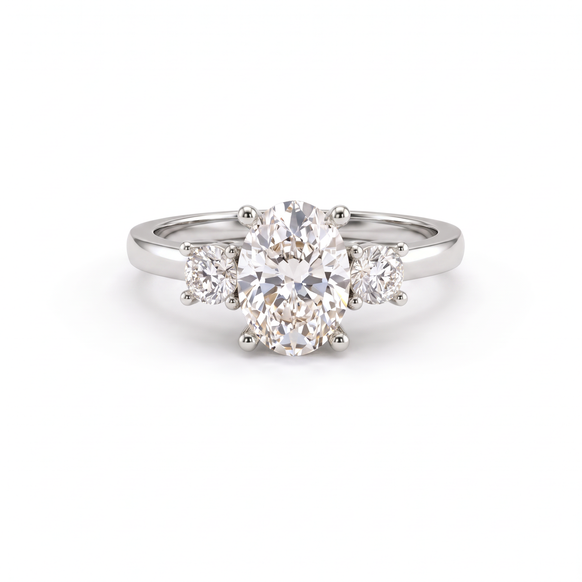 Oval three-stone engagement ring in solid 14K white gold, 1ct oval Lab-Grown Diamond flanked by two round side stones