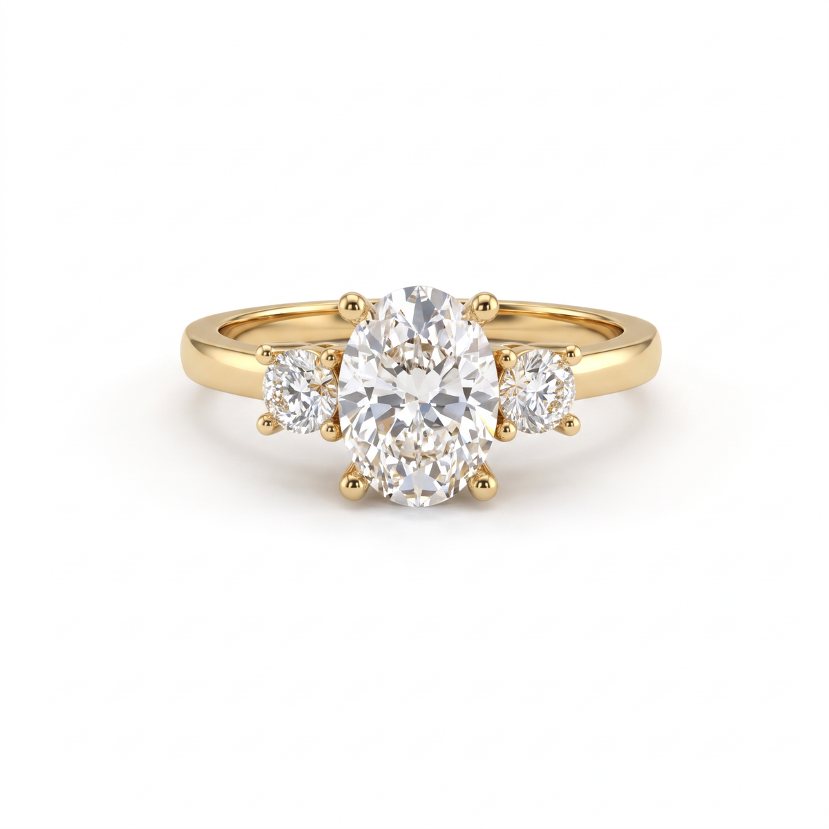 Oval three-stone engagement ring in solid 14K yellow gold, 1ct oval Lab-Grown Diamond flanked by two round side stones