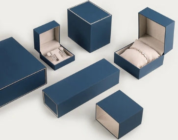 Set of blue jewelry boxes for jewelry on a white background
