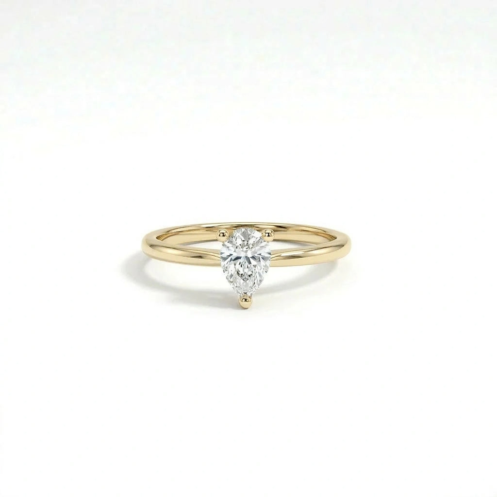 Pear solitaire ultra thin engagement ring with lab-grown diamond in solid 14K yellow gold