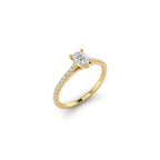 Angled view of pear ultra thin pavé engagement ring in solid 14K yellow gold