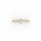 Top view of pear ultra thin pavé engagement ring in solid 14K yellow gold with lab-grown diamond