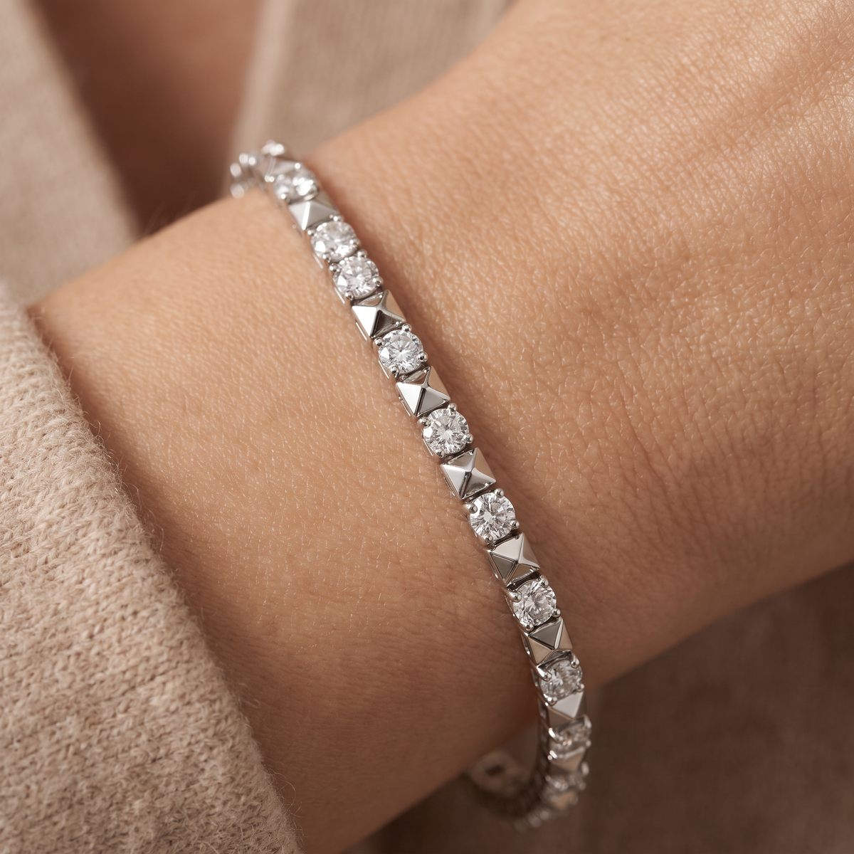Pyramid tennis bracelet in 14K white gold with Lab-Grown Diamonds worn on the wrist