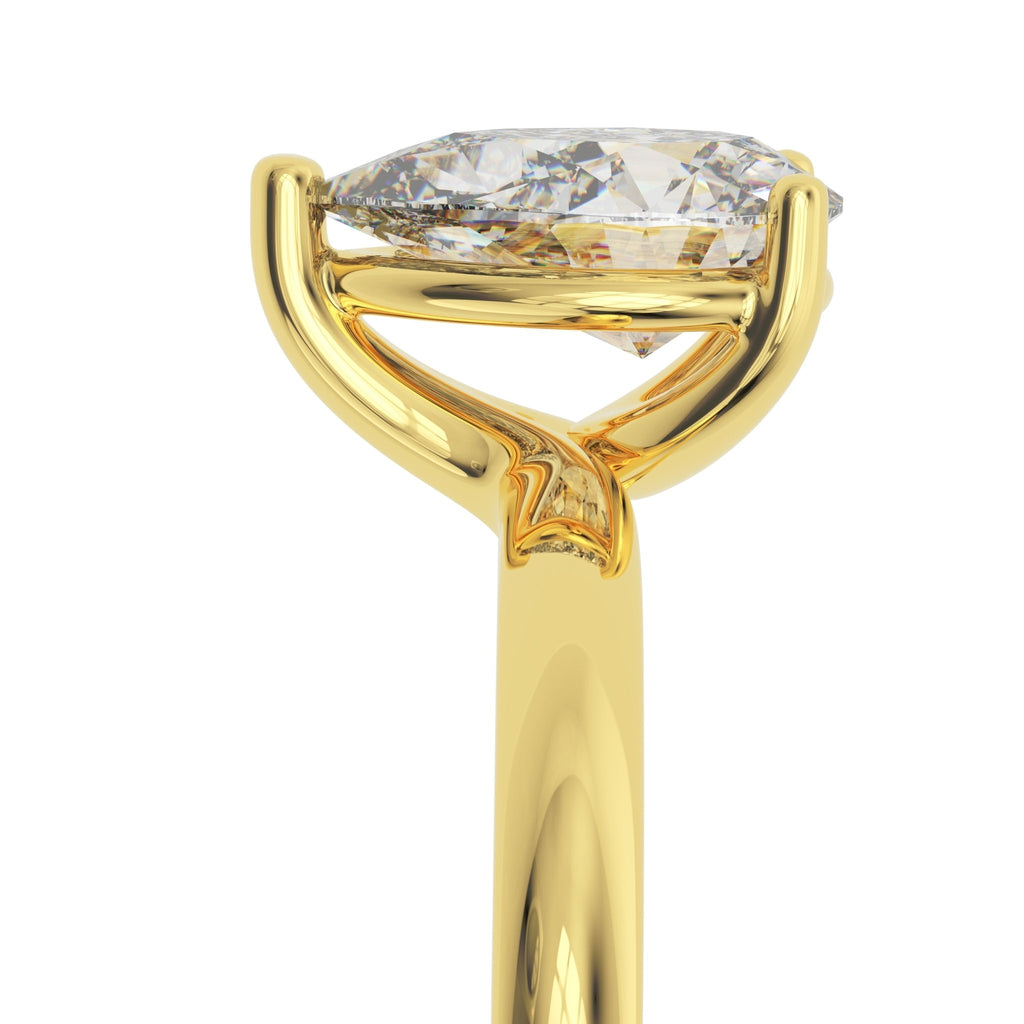 Profile view of Riverside pear solitaire engagement ring highlighting low-set pear diamond and polished gold band