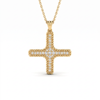Woman wearing the rope Greek cross pendant in 14K yellow gold on an adjustable chain at the collarbone