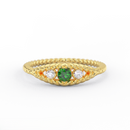 Three stone emerald ring with twisted rope band