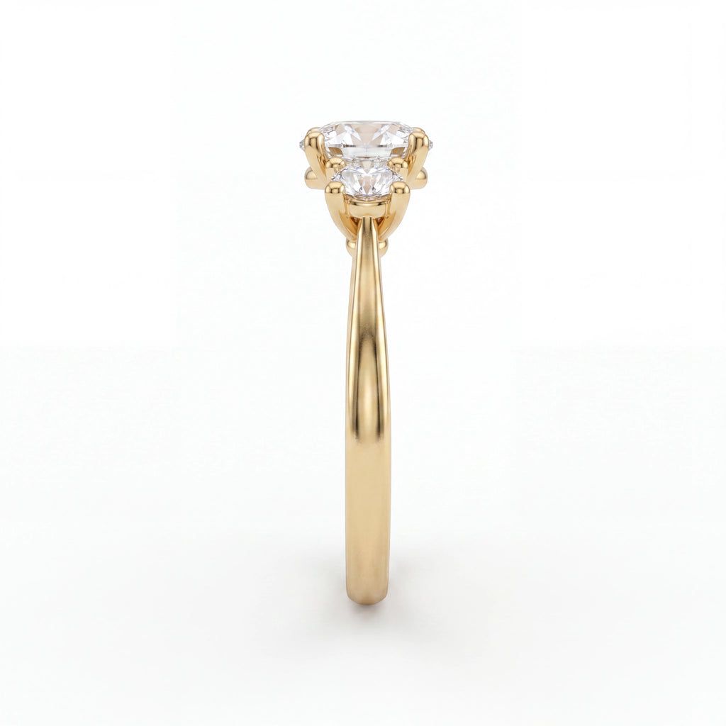 Round three-stone Lab-Grown Diamond engagement ring with 1ct center and two 0.35ct side stones, angled view