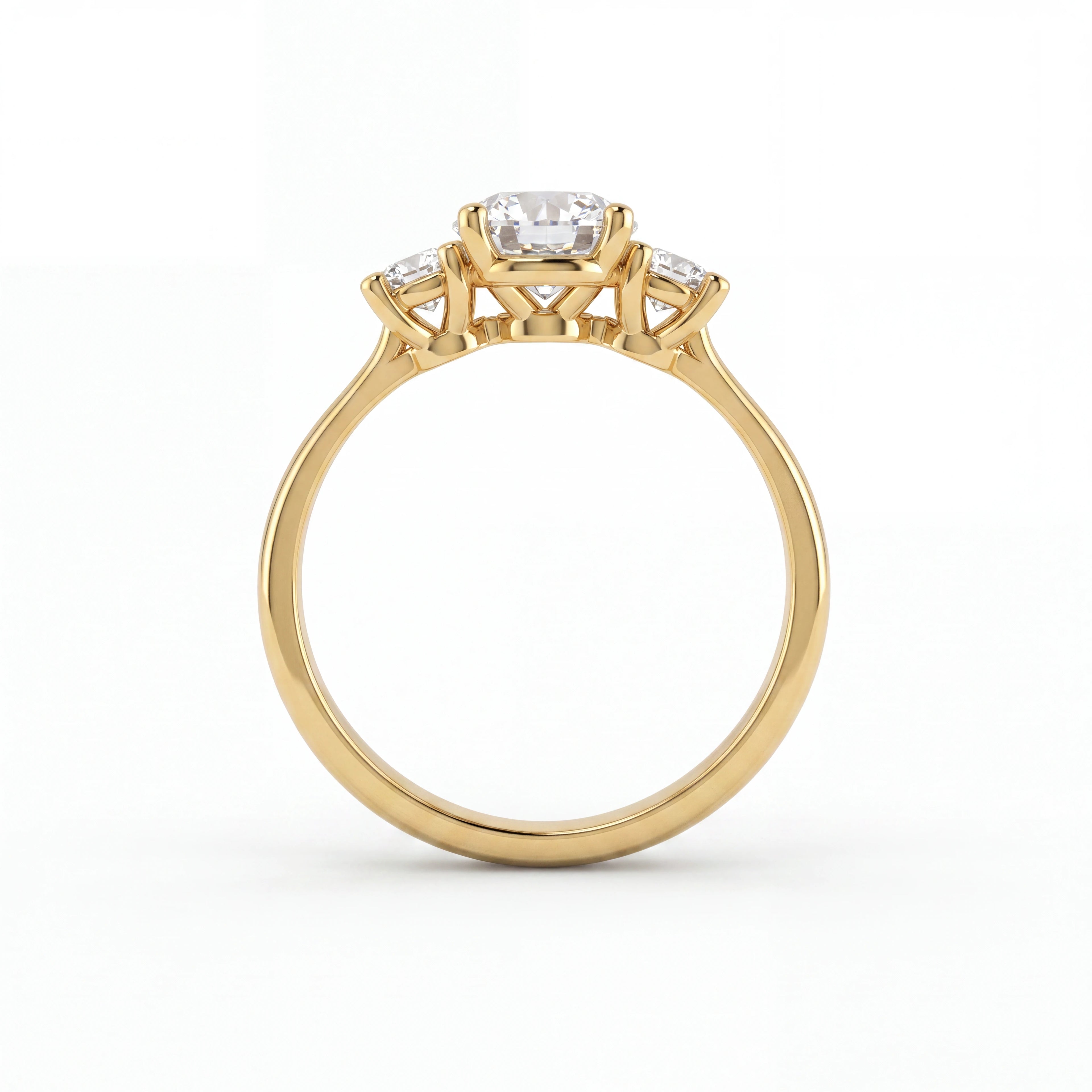 3-Stone round Lab-Grown Diamond engagement ring in 14K gold, close-up of the prong-set center diamond