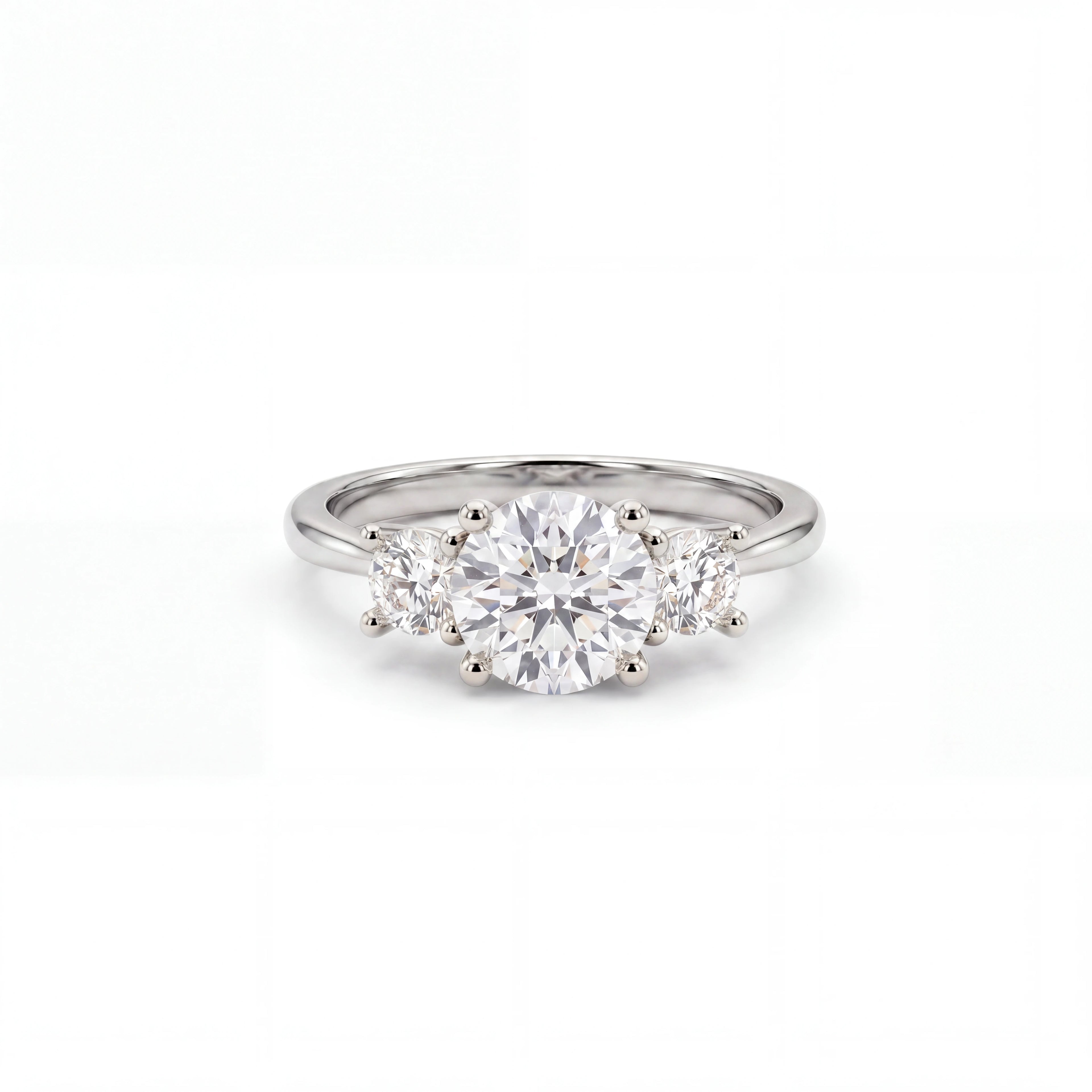 Three-stone round diamond engagement ring shown on the hand, 1.35ctw in 14K gold