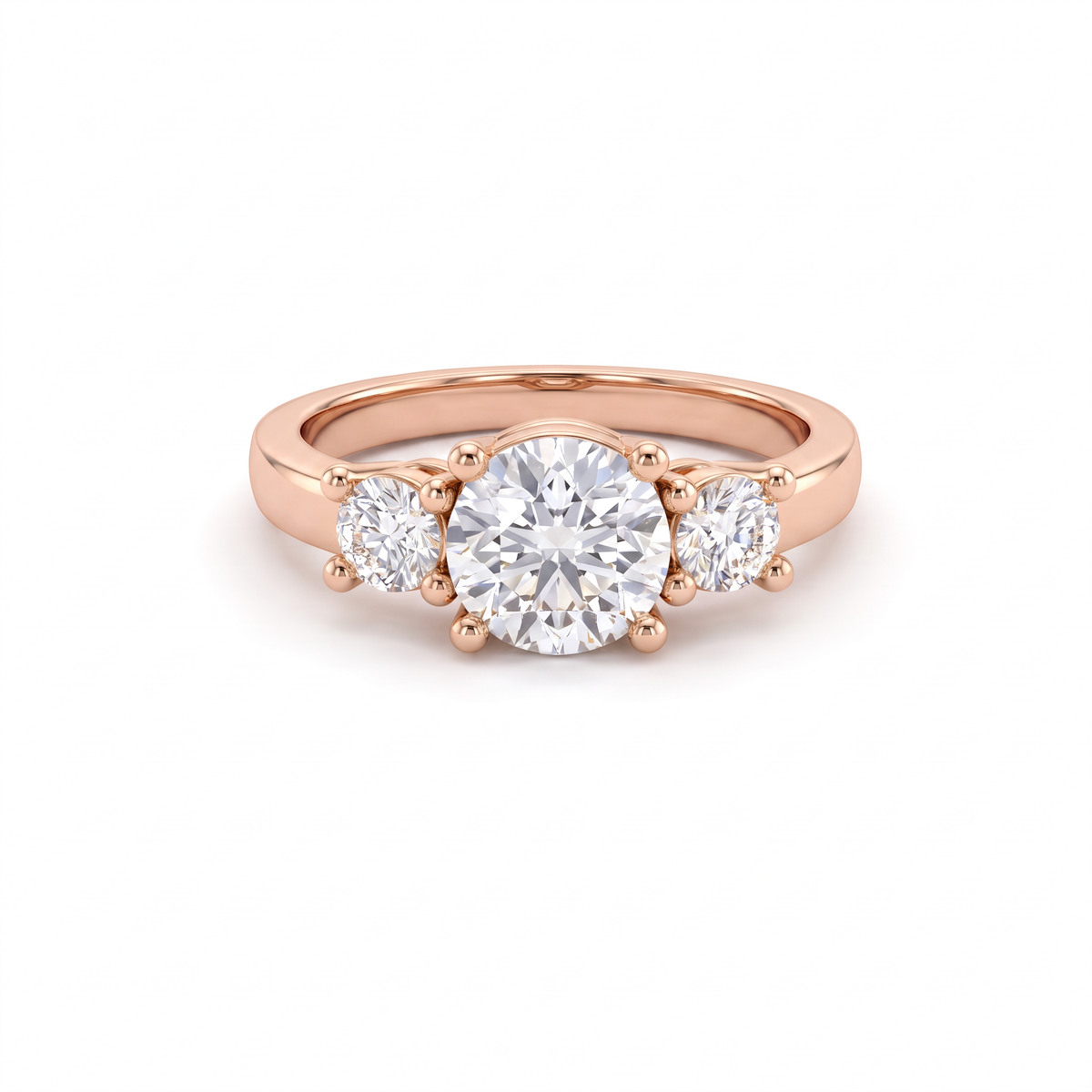 1ct round three-stone engagement ring in 14K rose gold, front view showing both round side stones
