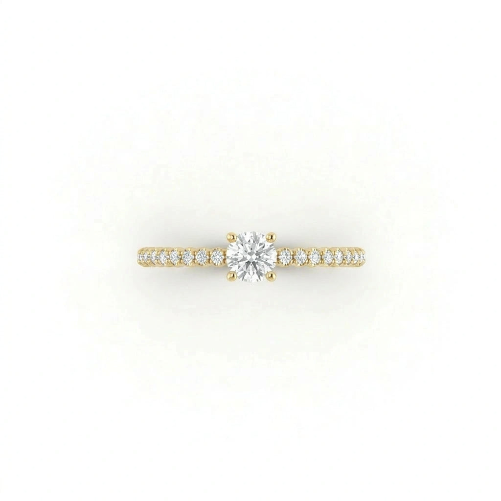 Top view of round ultra thin pavé engagement ring with lab-grown diamond in 14K yellow gold