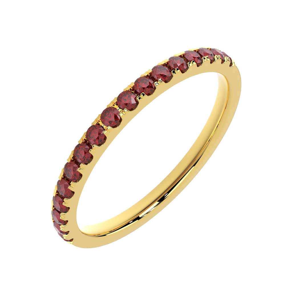 Side angle of ruby high dome half eternity ring in yellow gold