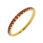 Side angle of ruby high dome half eternity ring in yellow gold - angle view