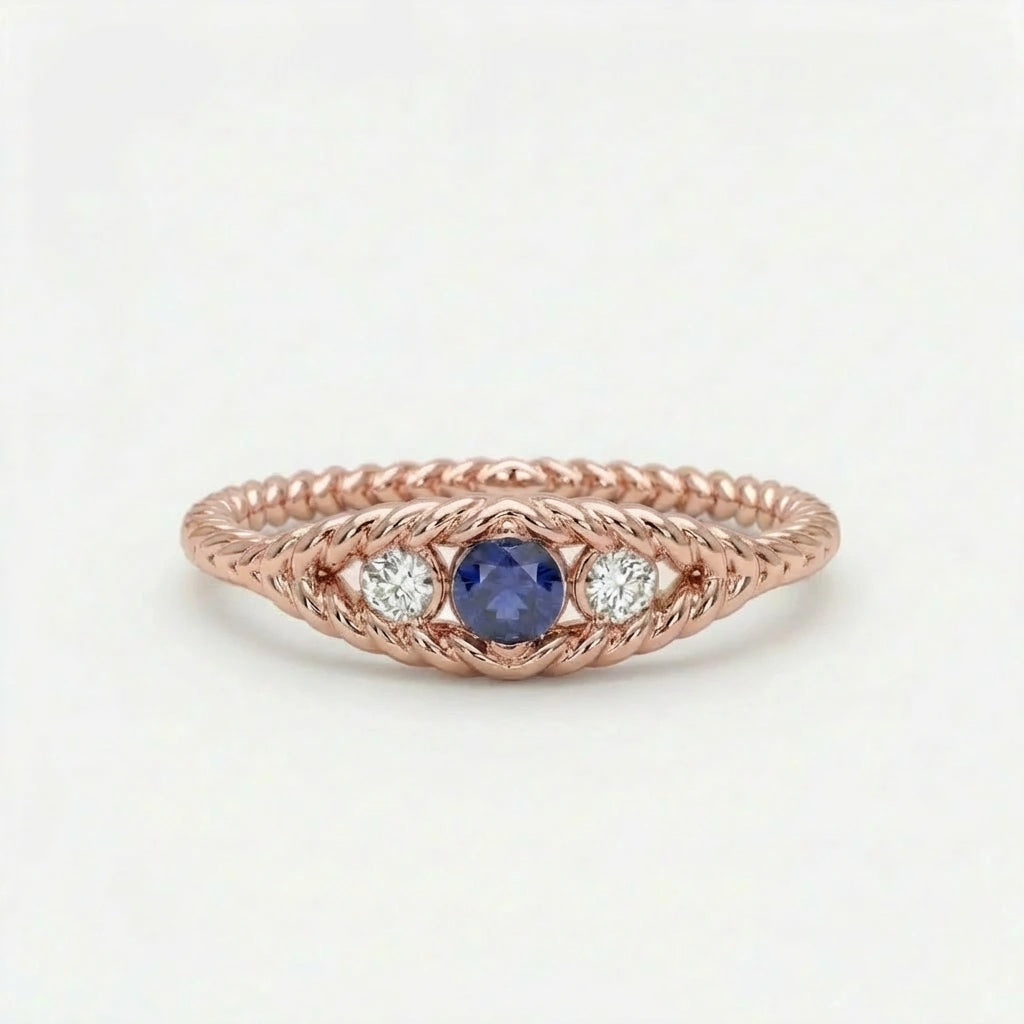 Sapphire twisted rope three-stone ring in 14K rose gold - vintage-inspired design with blue sapphire center