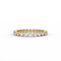 Shared prong diamond eternity band in solid 14K yellow gold
