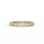 Shared prong diamond eternity band in solid 14K yellow gold