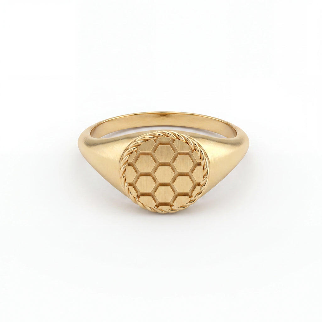 Solid 14K rose gold soccer signet ring, front view of honeycomb face — Black Pearl of Queens