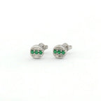 Tauren emerald line stud earrings in 14k white gold with clean horizontal emerald line and modern minimal design