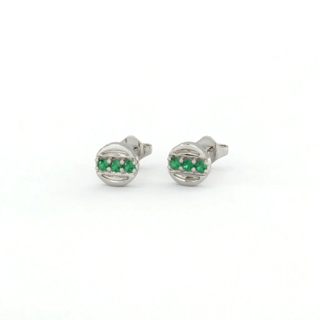 Tauren emerald line stud earrings in 14k white gold with clean horizontal emerald line and modern minimal design