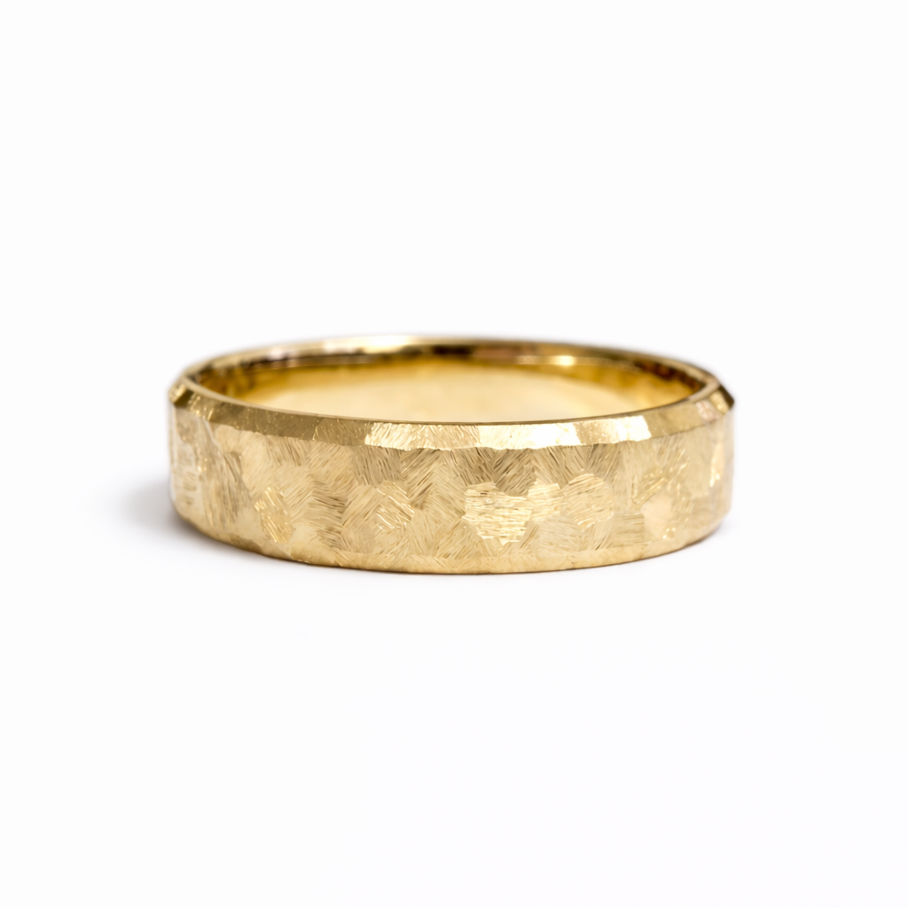 Solid 14K yellow gold textured wedding band handcrafted in New York