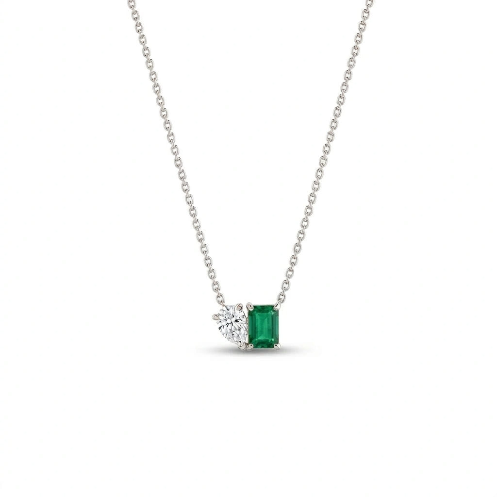 Pear diamond and emerald cut emerald Toi et Moi necklace in 14k white gold