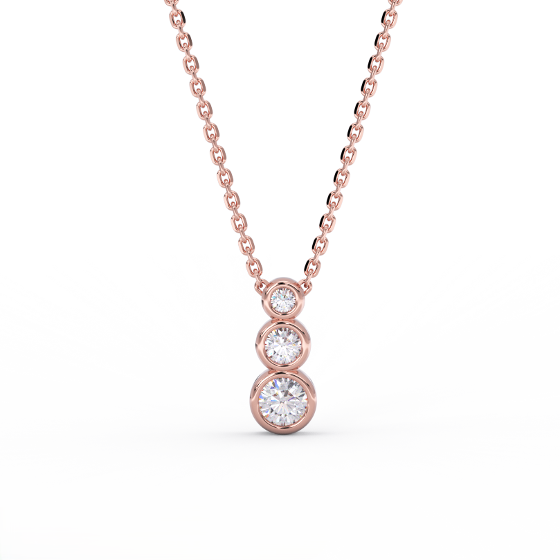 Tria Bezel Diamond Necklace in 14K rose gold featuring three bezel set round diamonds