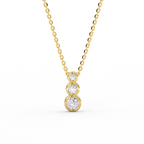 Tria Bezel Diamond Necklace in 14K yellow gold with three round bezel set diamonds