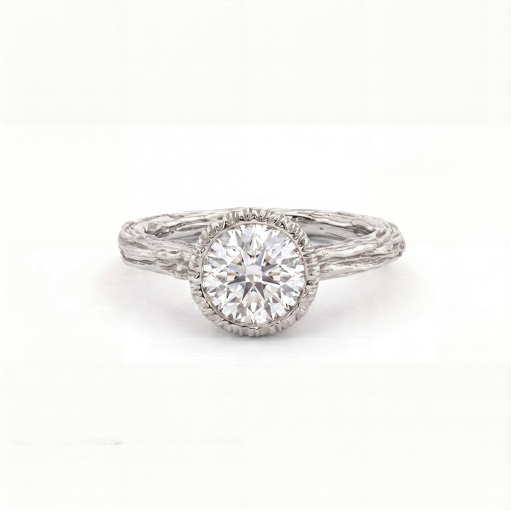 Branch-textured bezel engagement ring in solid 14K gold, bark detail along the band