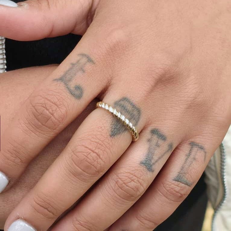 Twisted Rope Band 3mm in 14K Gold worn on finger