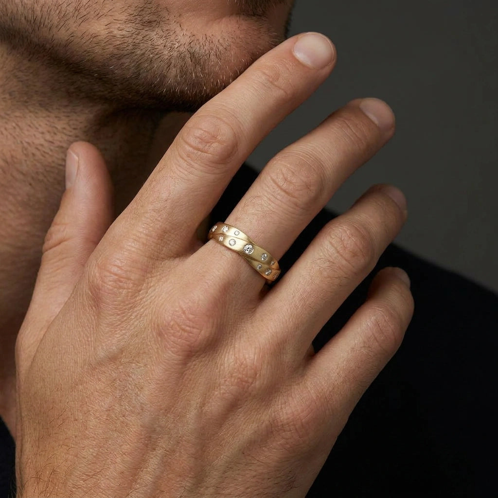 Twisted satin diamond wedding band in 14K gold with round lab-grown diamonds set across a crossover silhouette