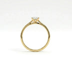 Side profile of ultra thin princess cut engagement ring in solid 14k yellow gold