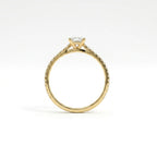 Side profile of ultra thin princess cut pavé engagement ring with cathedral setting