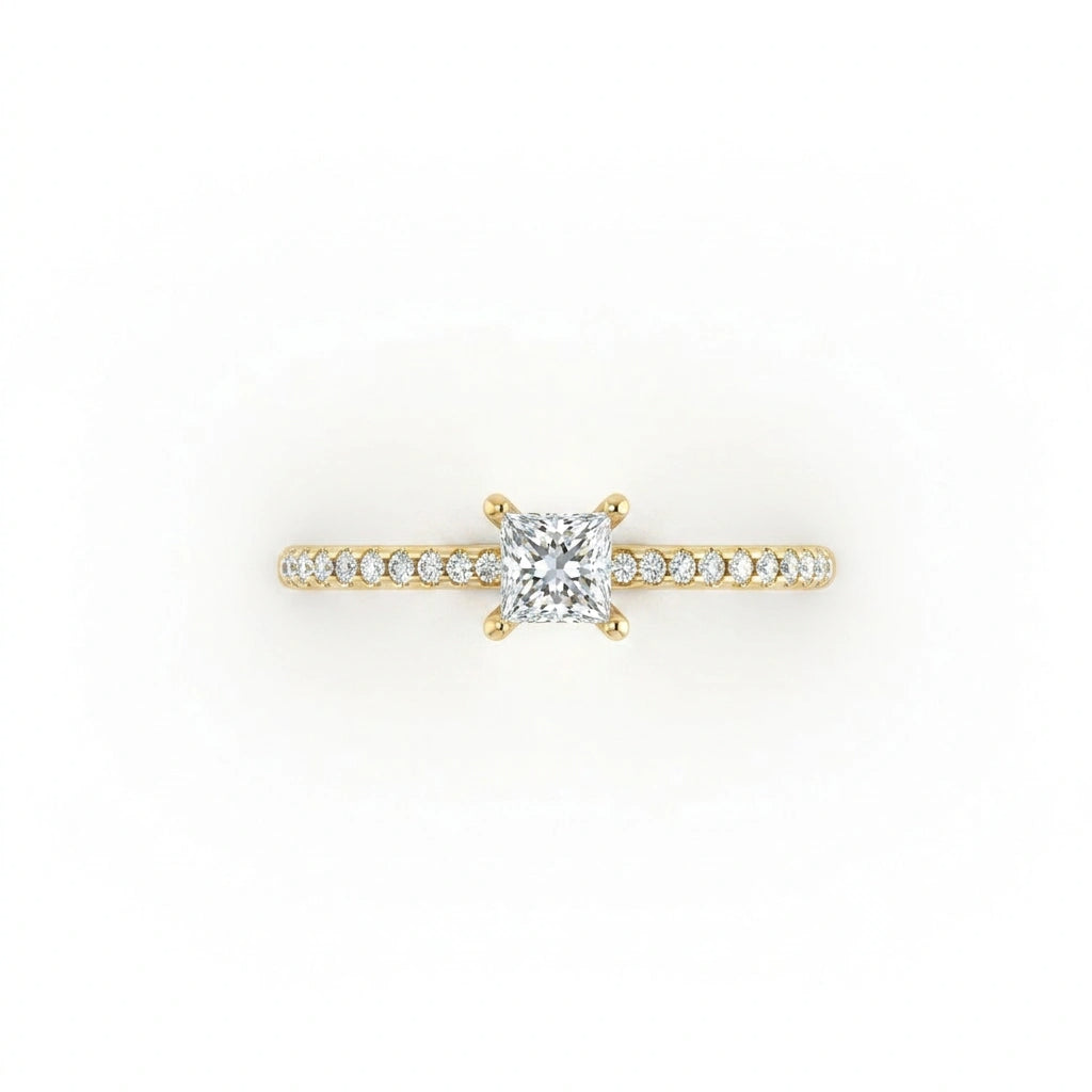 Top view of ultra thin princess cut pavé ring in solid 14k yellow gold