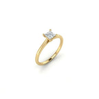 Angled view of ultra thin princess cut solitaire ring with four prong setting