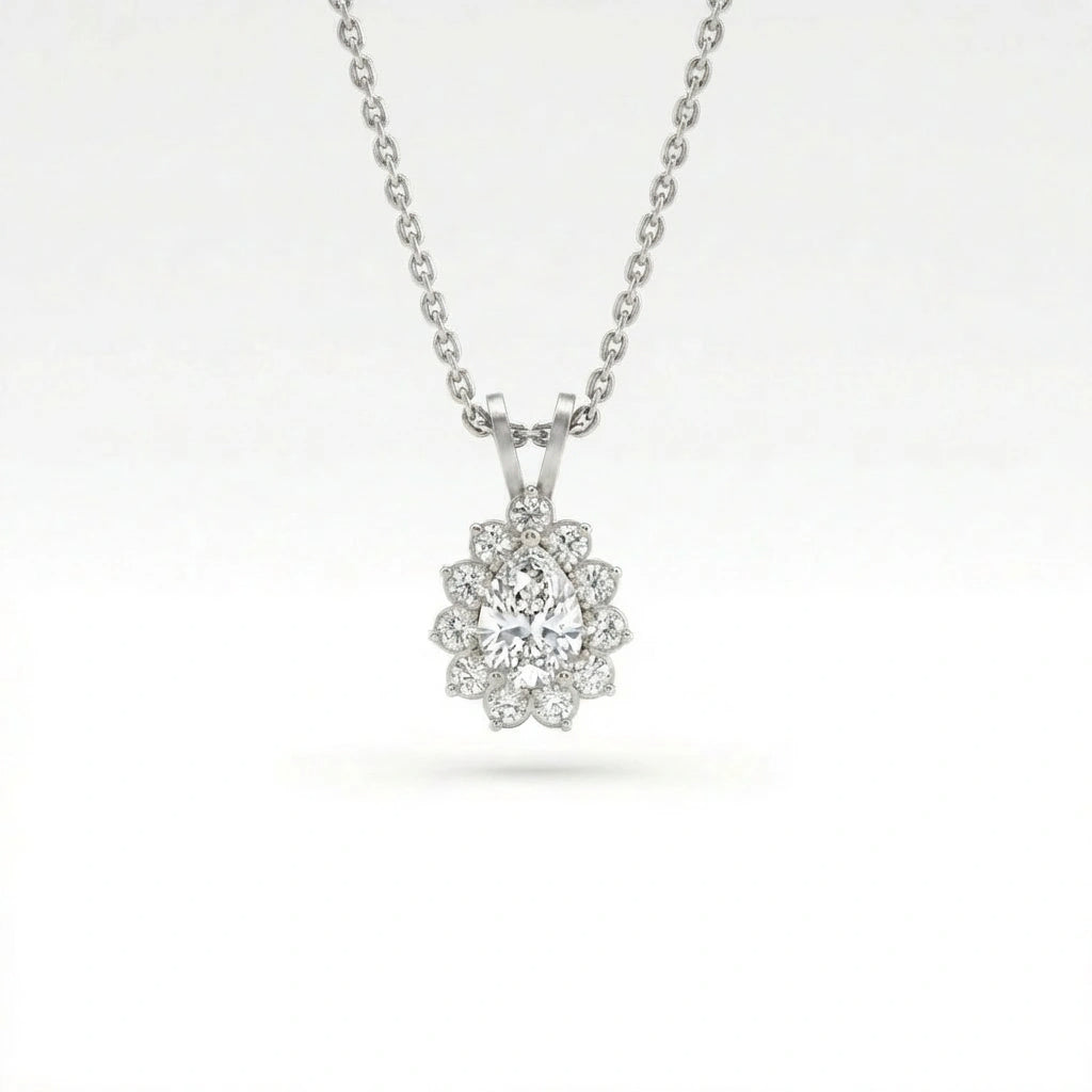 Valeria halo pendant in 14K white gold with pear-shaped diamond center surrounded by round diamond halo, front view